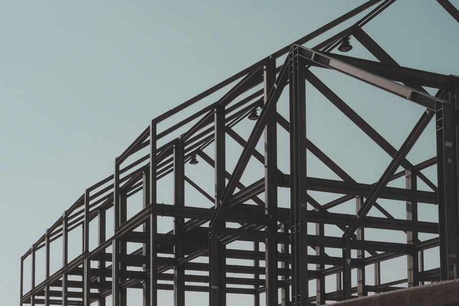 Structural steel portal frame erected on site